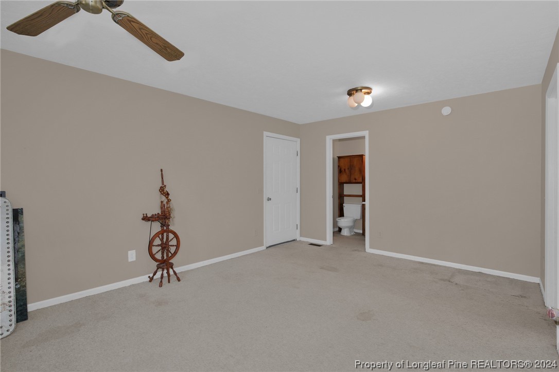 417 Farm Life School Road Carthage, NC 28327 - Photo 15 of 33 wooden floor in an empty room