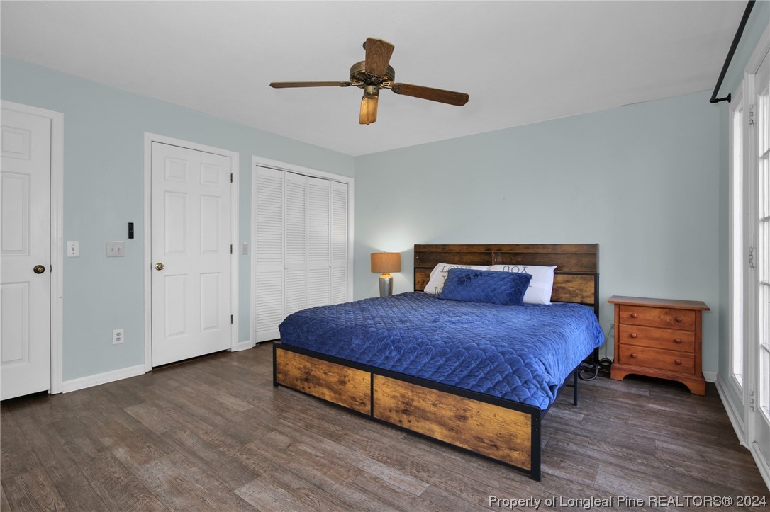 417 Farm Life School Road Carthage, NC 28327 - Photo 23 of 33 a bedroom with a bed and dresser