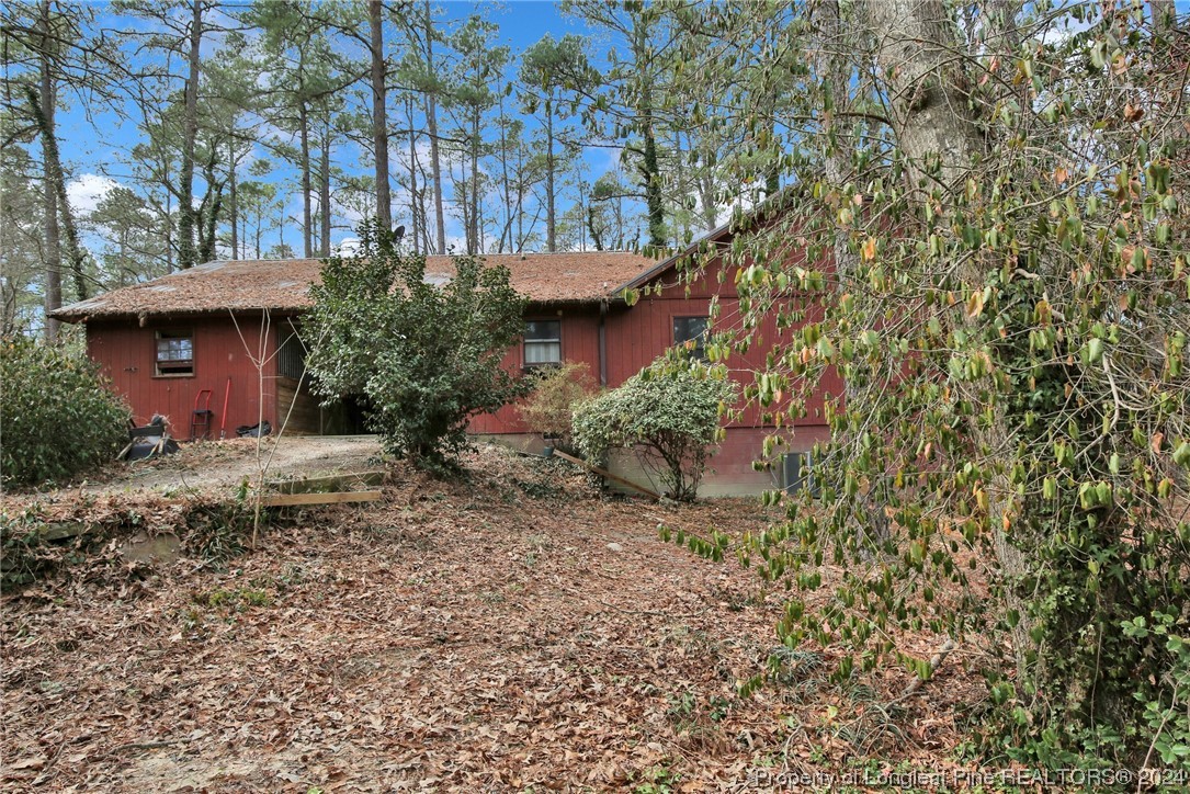 417 Farm Life School Road Carthage, NC 28327 - Photo 30 of 33 a view of a house with a yard