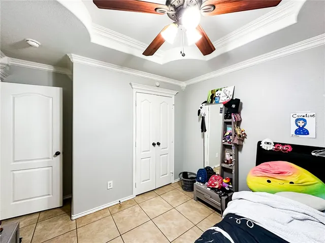 a bedroom with furniture and a bed