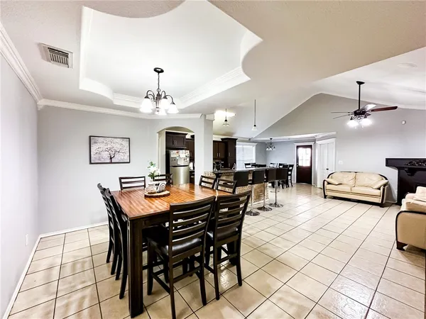a view of a dining room with furniture