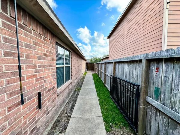 a view of a balcony with wooden floor