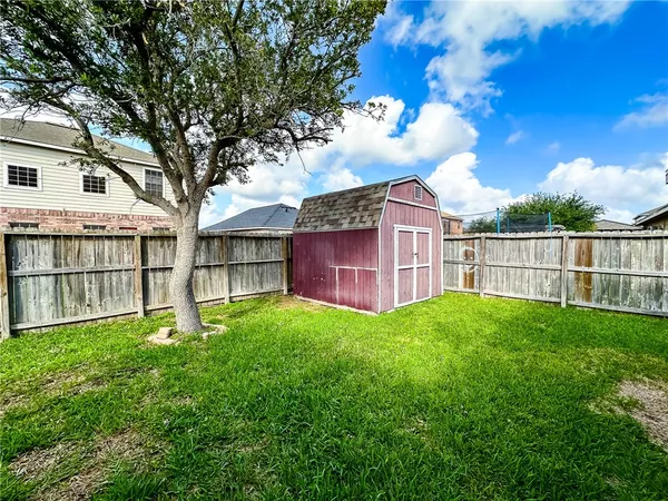 a house view with a garden space