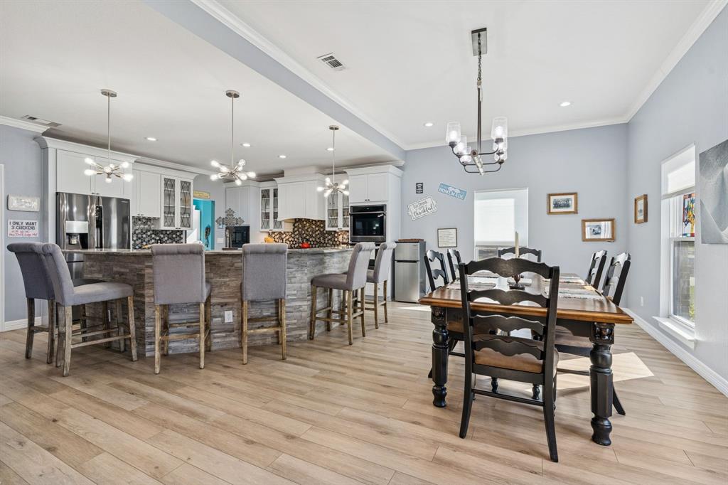 10832 Ridge Country Road Haslet, TX 76052 - Photo 12 of 30 Entertaining will be a breeze in this perfectly designed kitchen & dining area!