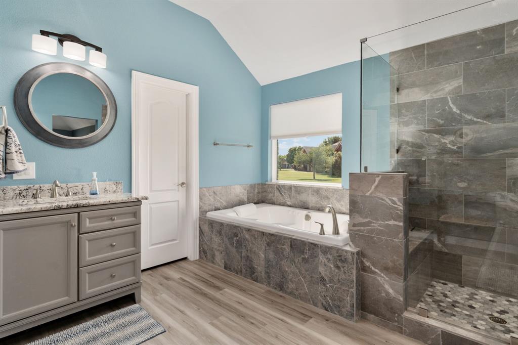 10832 Ridge Country Road Haslet, TX 76052 - Photo 16 of 30 Jetted soaking tub, walk-in closet door on the left, & the amazing shower on the right!