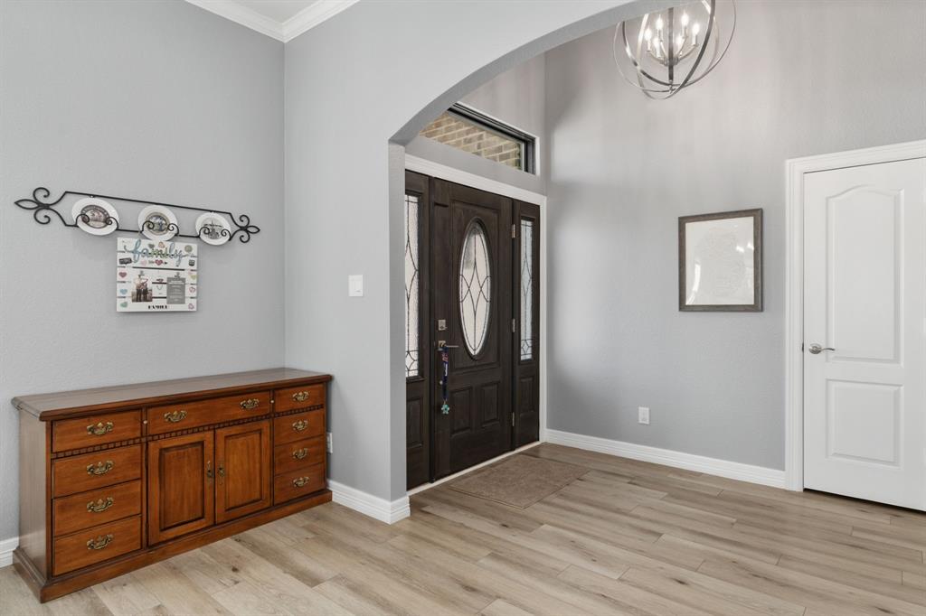 10832 Ridge Country Road Haslet, TX 76052 - Photo 4 of 30 Step right in to the home & check out the open concept felt in all living and dining areas!