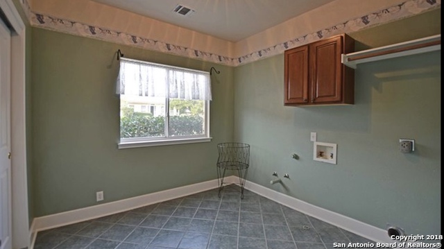 9634 Jason Bend Helotes, TX 78023 - Photo 21 of 43 a view of an empty room with a window