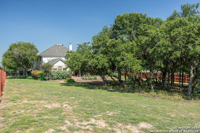 9634 Jason Bend Helotes, TX 78023 - Photo 40 of 43 a view of a yard in front of a house