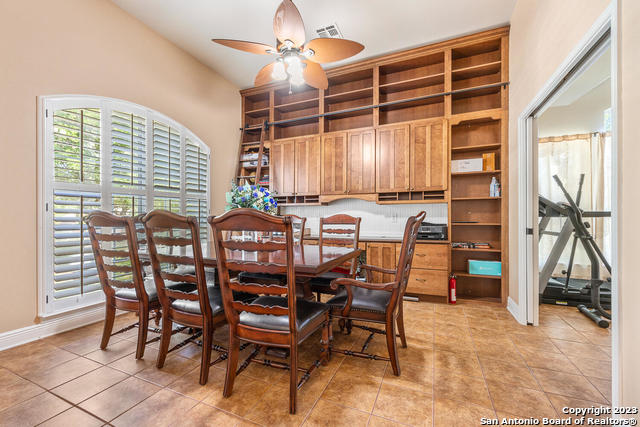 9634 Jason Bend Helotes, TX 78023 - Photo 5 of 43 a view of a dining room with furniture and a window