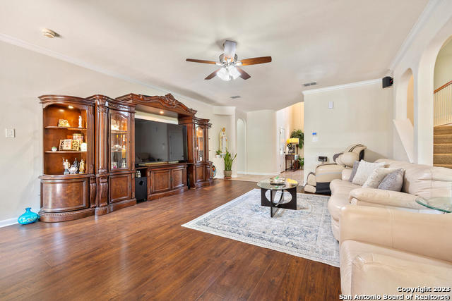 9634 Jason Bend Helotes, TX 78023 - Photo 8 of 43 a living room with furniture and a flat screen tv