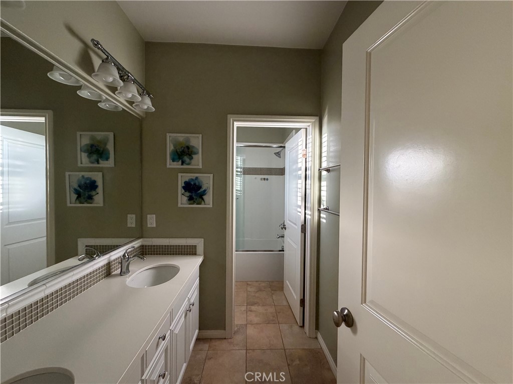 45 Diamond Irvine, CA 92620 - Photo 12 of 12 a bathroom with a sink a toilet and shower
