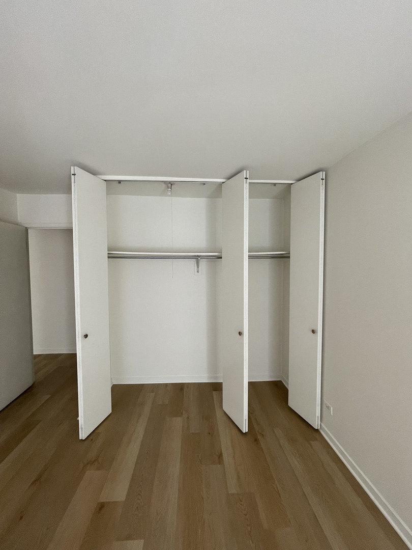 211 East Ohio Street, Unit 1013 Chicago, IL 60611 - Photo 8 of 12 a view of an empty room