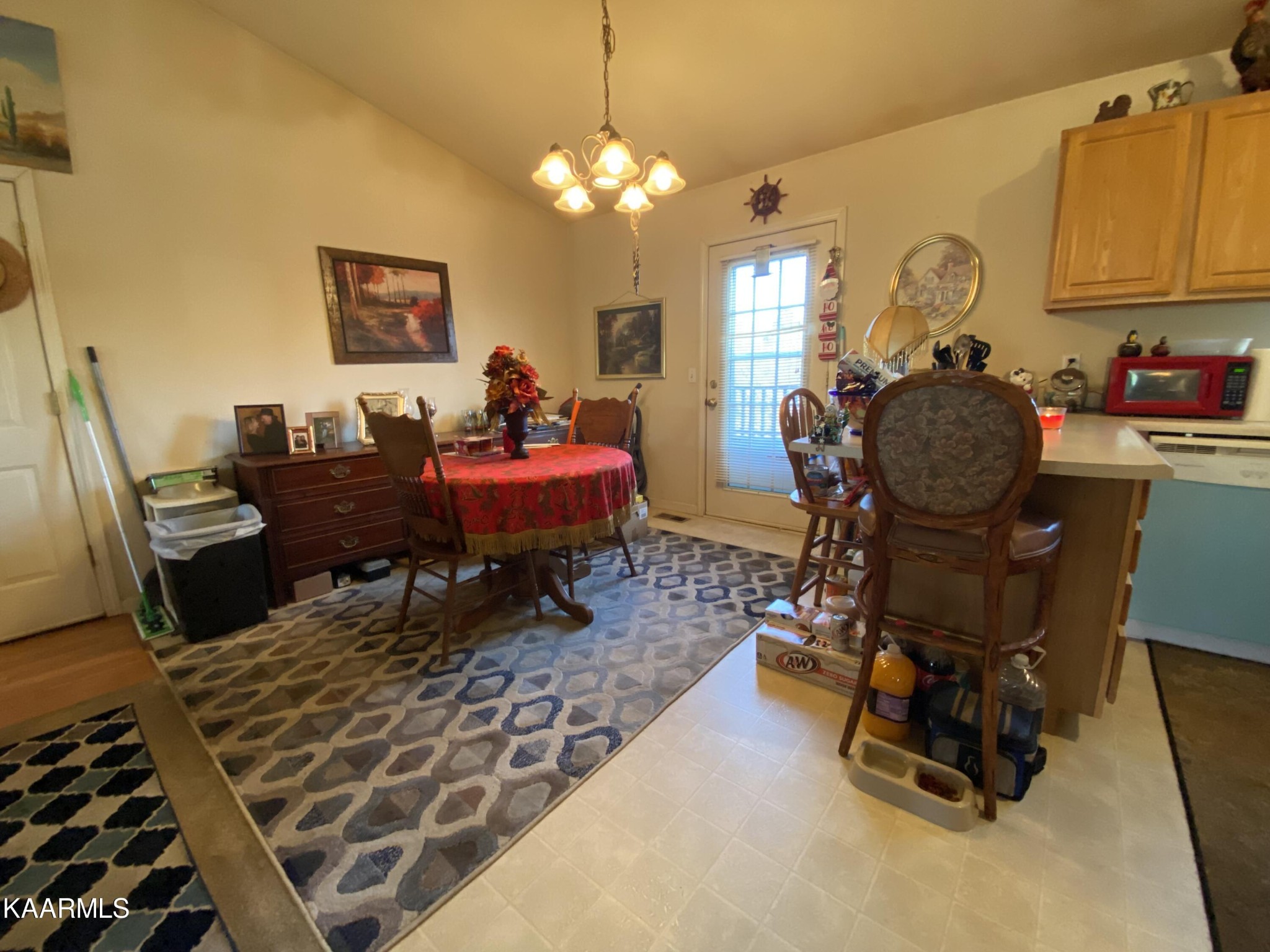 119 Micah Way Rutledge, TN 37861 - Photo 42 of 49 a living room with furniture and a chandelier