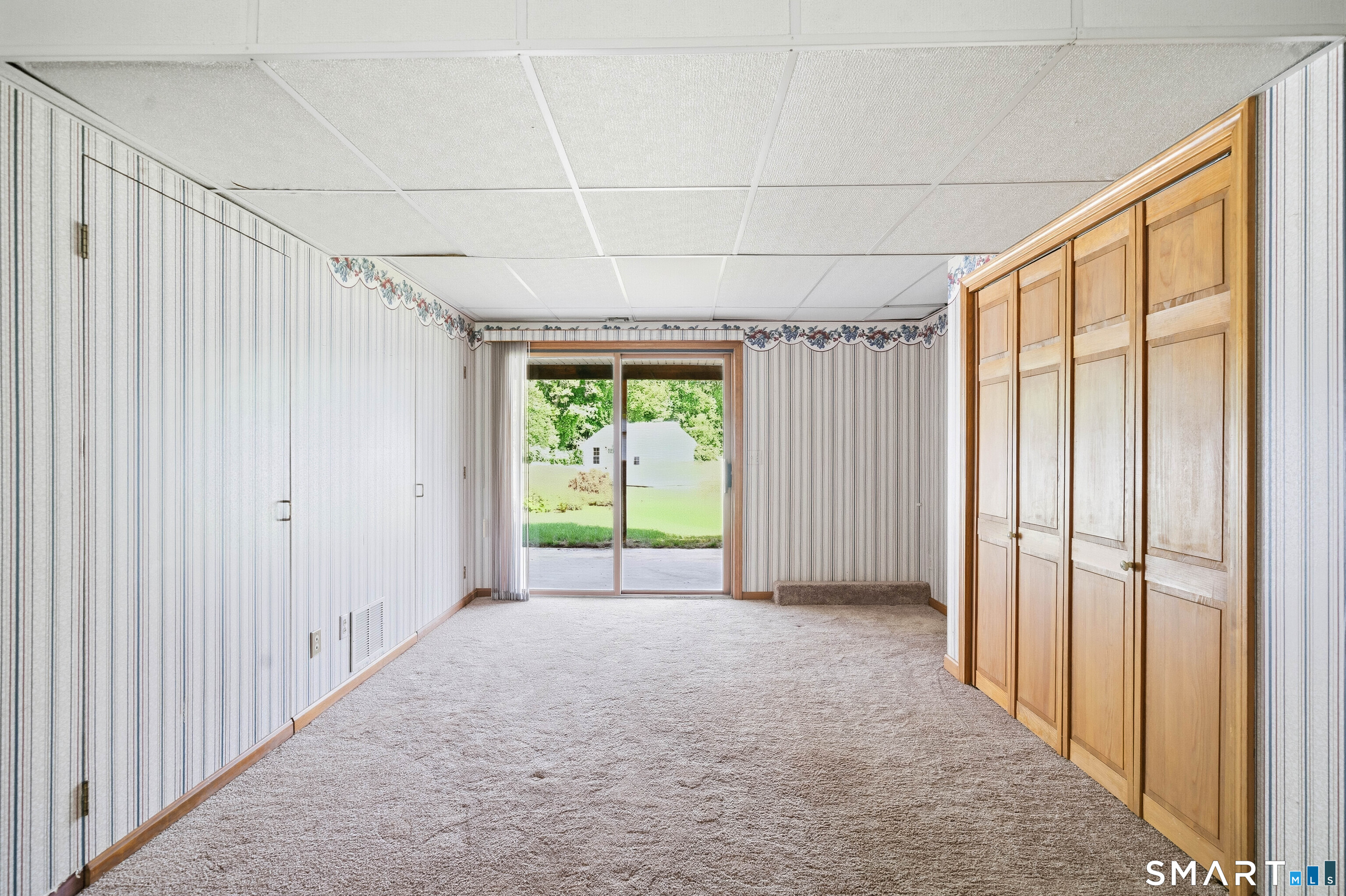 17 Spruceland Road Enfield, CT 06082 - Photo 31 of 40 Walk out lower level family room and large closet