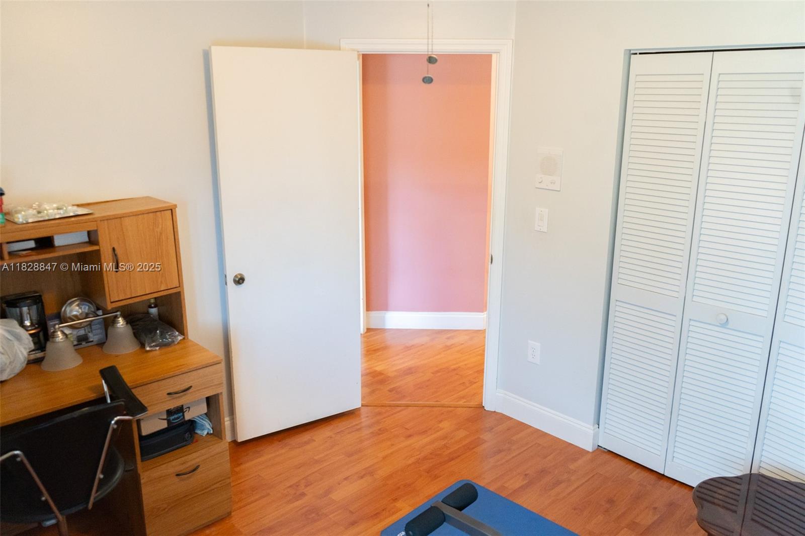 13402 Southwest 153rd Street, Unit 1904 Miami, FL 33177 - Photo 19 of 26 a view of a room with wooden floor and closet