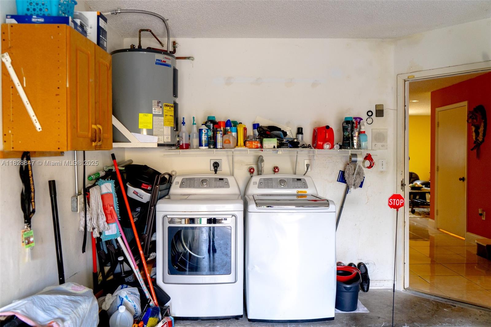 13402 Southwest 153rd Street, Unit 1904 Miami, FL 33177 - Photo 25 of 26 a utility room with dryer and washer