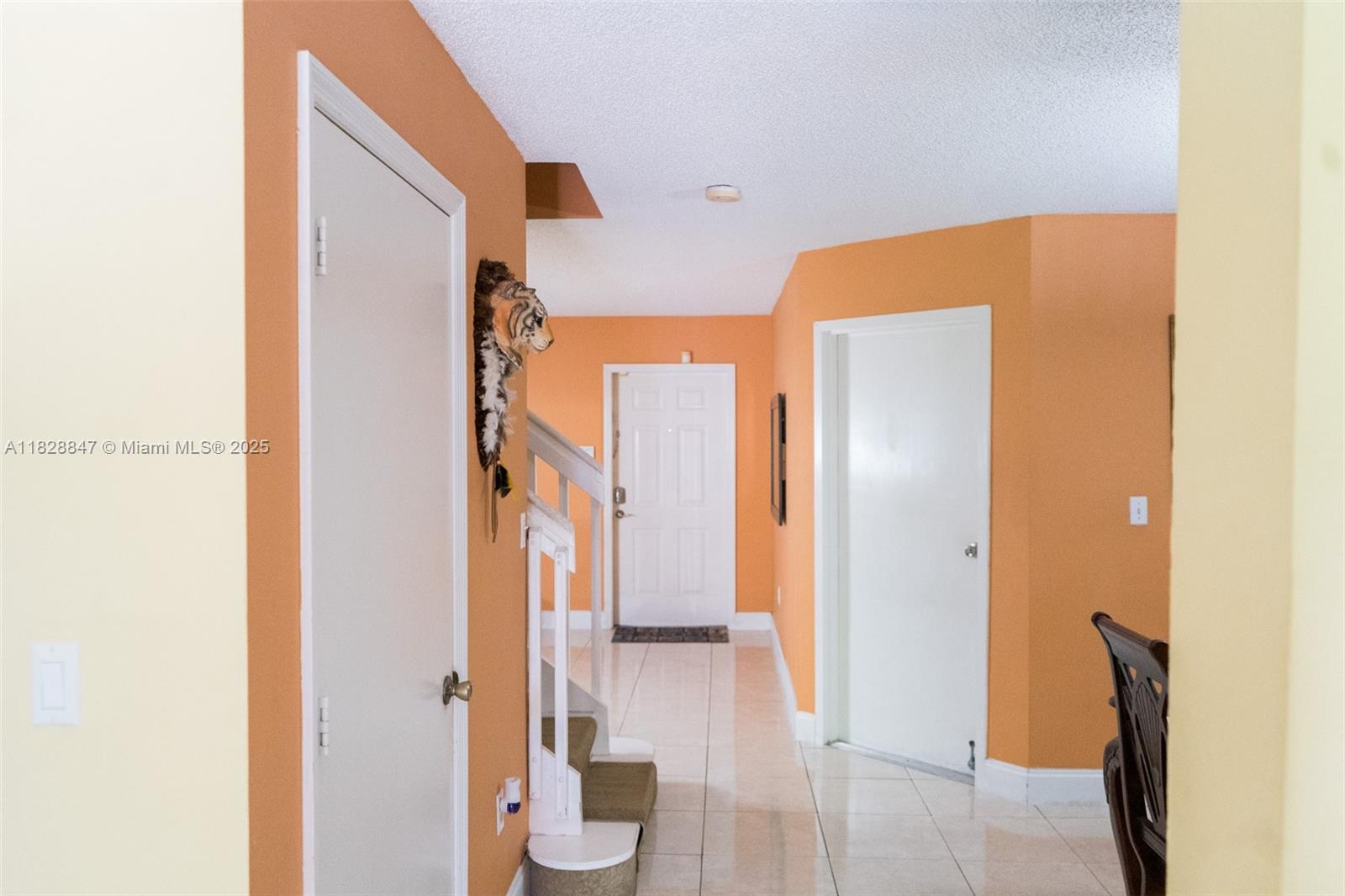 13402 Southwest 153rd Street, Unit 1904 Miami, FL 33177 - Photo 4 of 26 a bathroom with a sink and a mirror