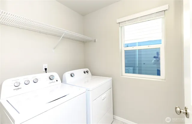 a view of a bathroom sink and mirror