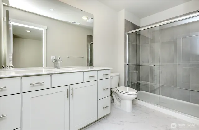 a aerial view of a house with swimming pool