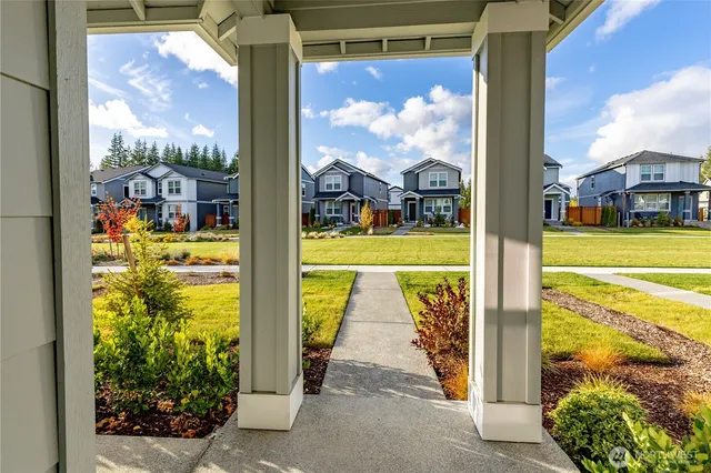 a view of a porch with wooden floor
