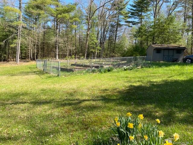 592 Proctor Road Glen Spey, NY 12737 - Photo 5 of 9 a view of a house with a backyard
