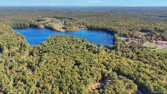 a view of a room with an ocean and mountain view