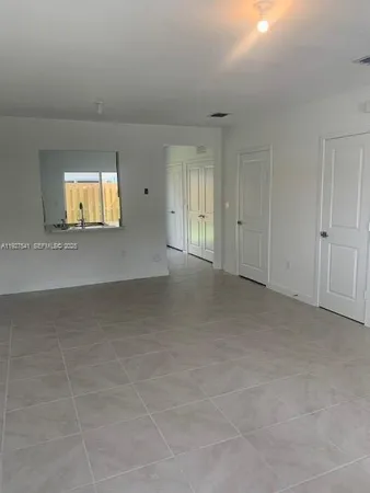 a view of empty room with window