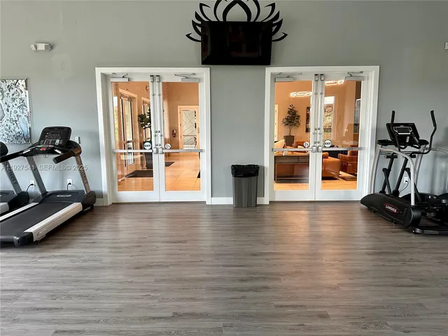 a view of a room with gym equipment
