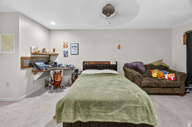 730 East 200 North Logan, UT 84321 - Photo 15 of 28 Carpeted room featuring a ceiling fan, recessed lighting, and a built-in wood-finish corner desk