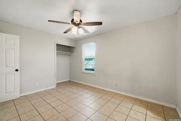 a view of an empty room and window