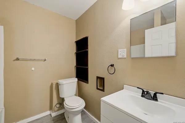 a bathroom with a sink and a toilet