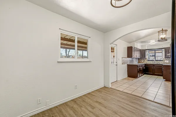 a view of a kitchen with a sink cabinets and a window