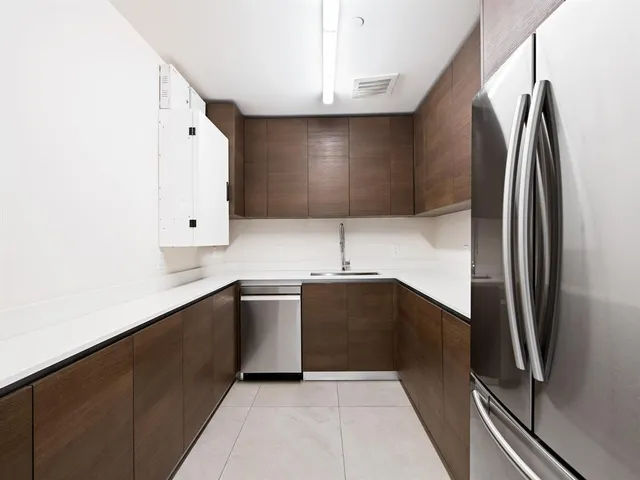 a view of a building with a yard