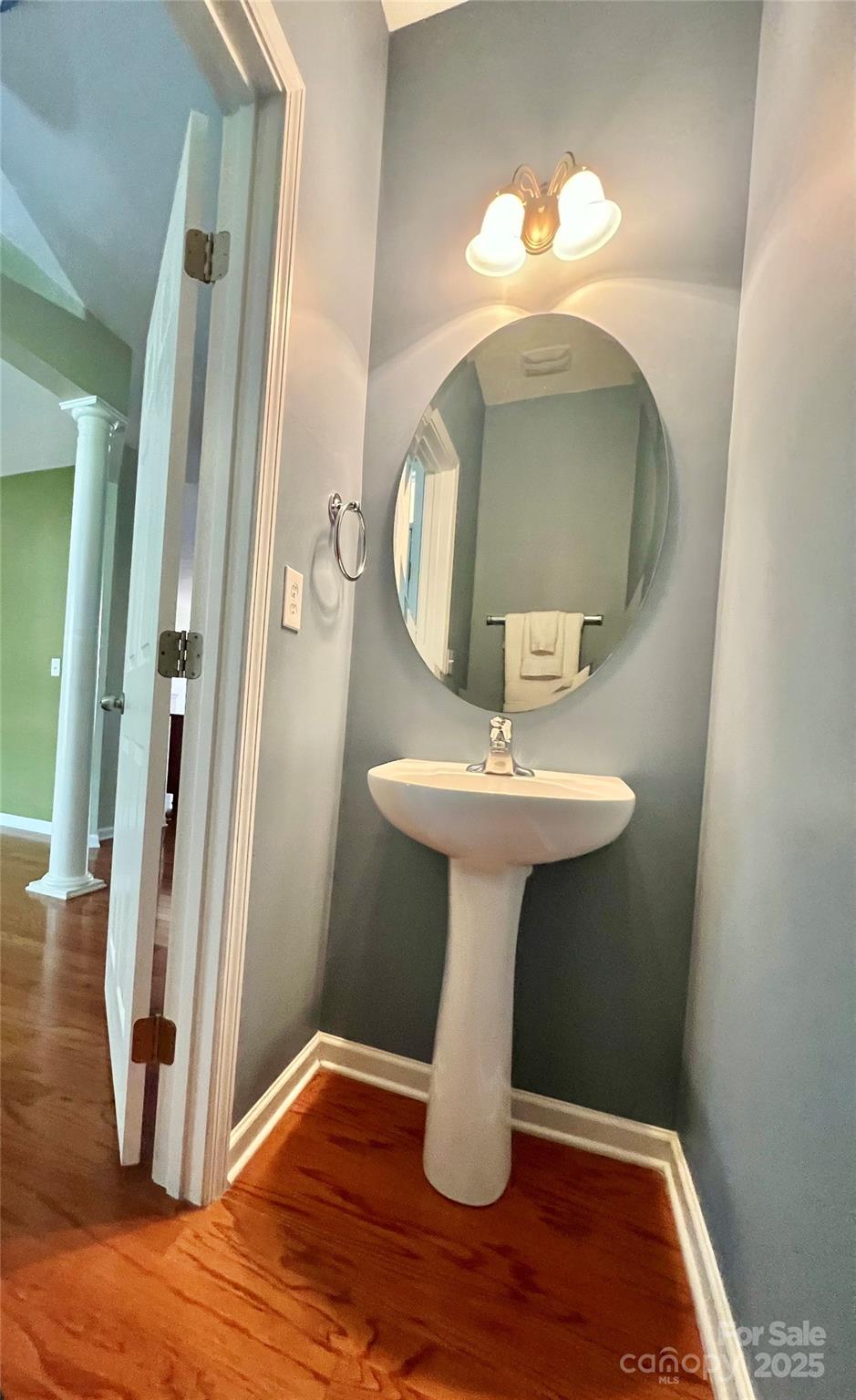 8326 Viewpoint Lane, Unit 802 Cornelius, NC 28031 - Photo 21 of 43 a bathroom with a sink and mirror