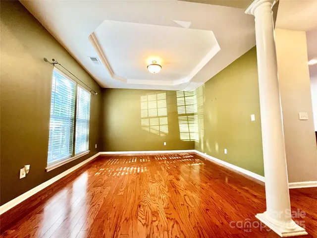 a large kitchen with stainless steel appliances granite countertop a stove and a refrigerator