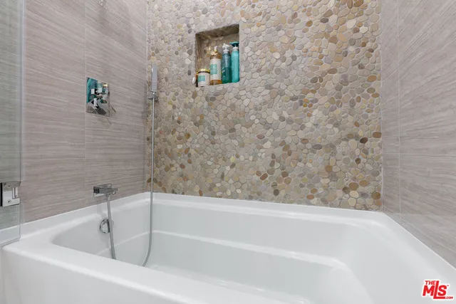 a bathroom with a bathtub