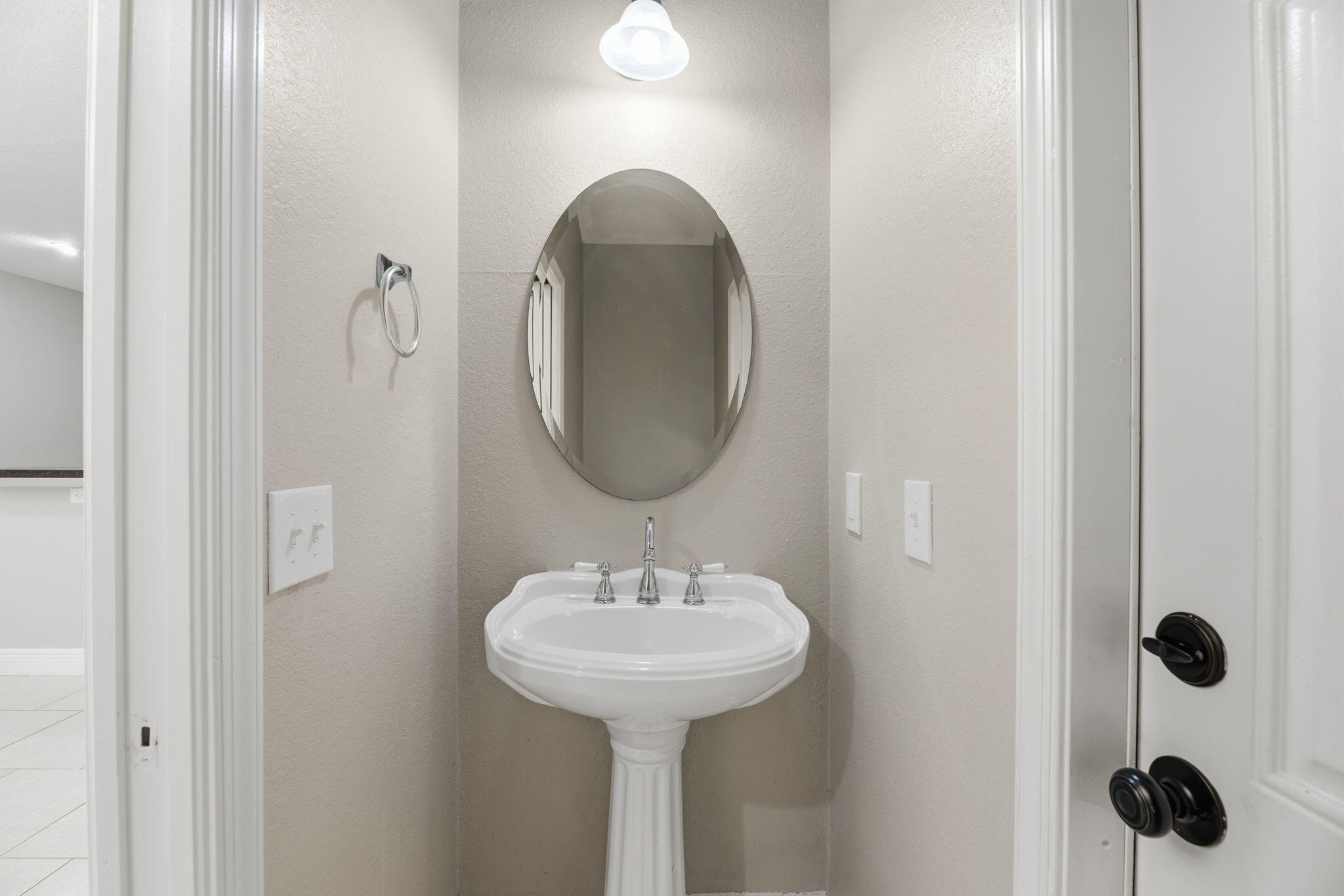 15731 85th Road North Loxahatchee, FL 33470 - Photo 32 of 65 a bathroom with a sink and mirror