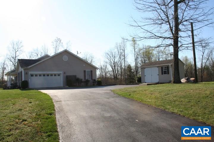 1910 Jacks Shop Road Rochelle, VA 22738 - Photo 16 of 16 a front view of a house with a yard and garage