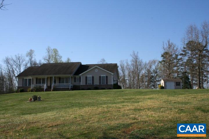 1910 Jacks Shop Road Rochelle, VA 22738 - Photo 4 of 16 a view of a big house with a big yard and large trees