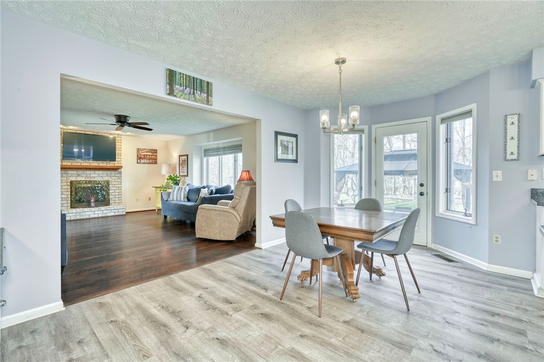 27 Edenfield Road Penfield, NY 14526 - Photo 13 of 48 updated eat-in kitchen with White cabinetry, grani