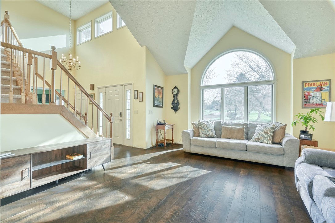 27 Edenfield Road Penfield, NY 14526 - Photo 2 of 48 IMPRESSIVE great room with vaulted ceilings and a