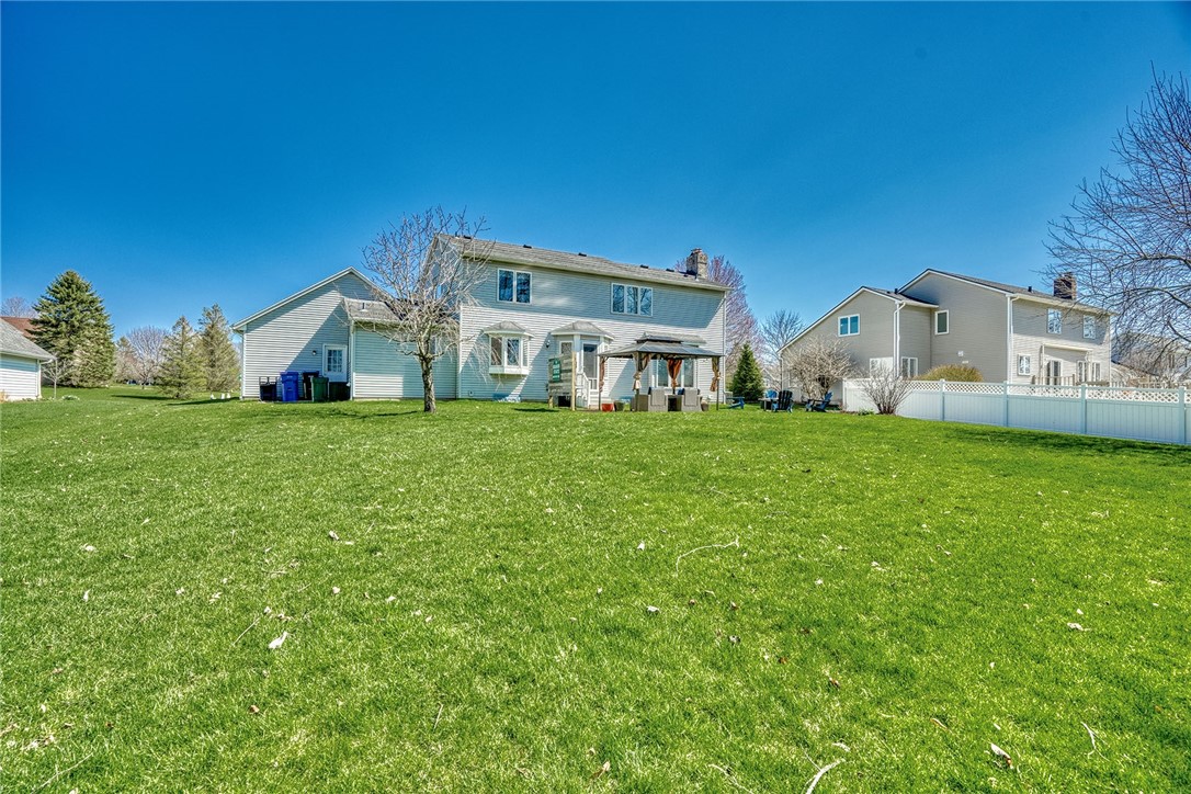 27 Edenfield Road Penfield, NY 14526 - Photo 39 of 48 Rear view of the home from the back of the lot