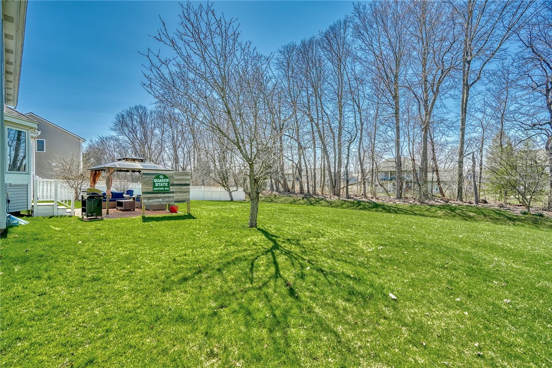 27 Edenfield Road Penfield, NY 14526 - Photo 40 of 48 View of the backyard- trees add a great layer of p