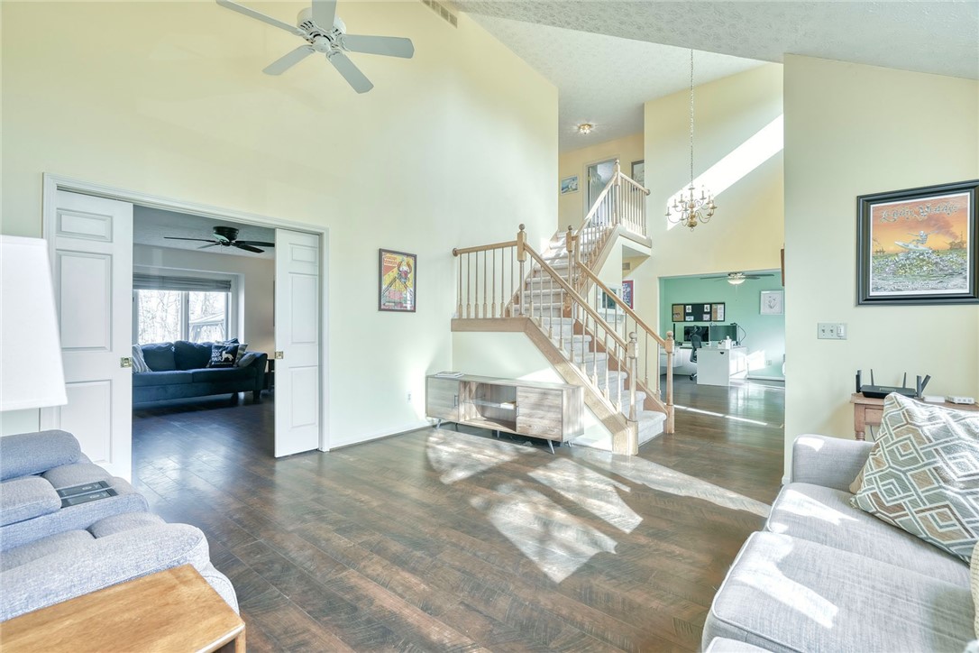 27 Edenfield Road Penfield, NY 14526 - Photo 4 of 48 IMPRESSIVE great room with vaulted ceilings and a
