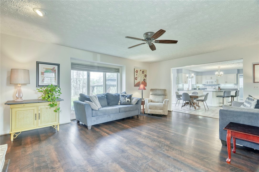 27 Edenfield Road Penfield, NY 14526 - Photo 6 of 48 pocket doors lead into separate family room with f