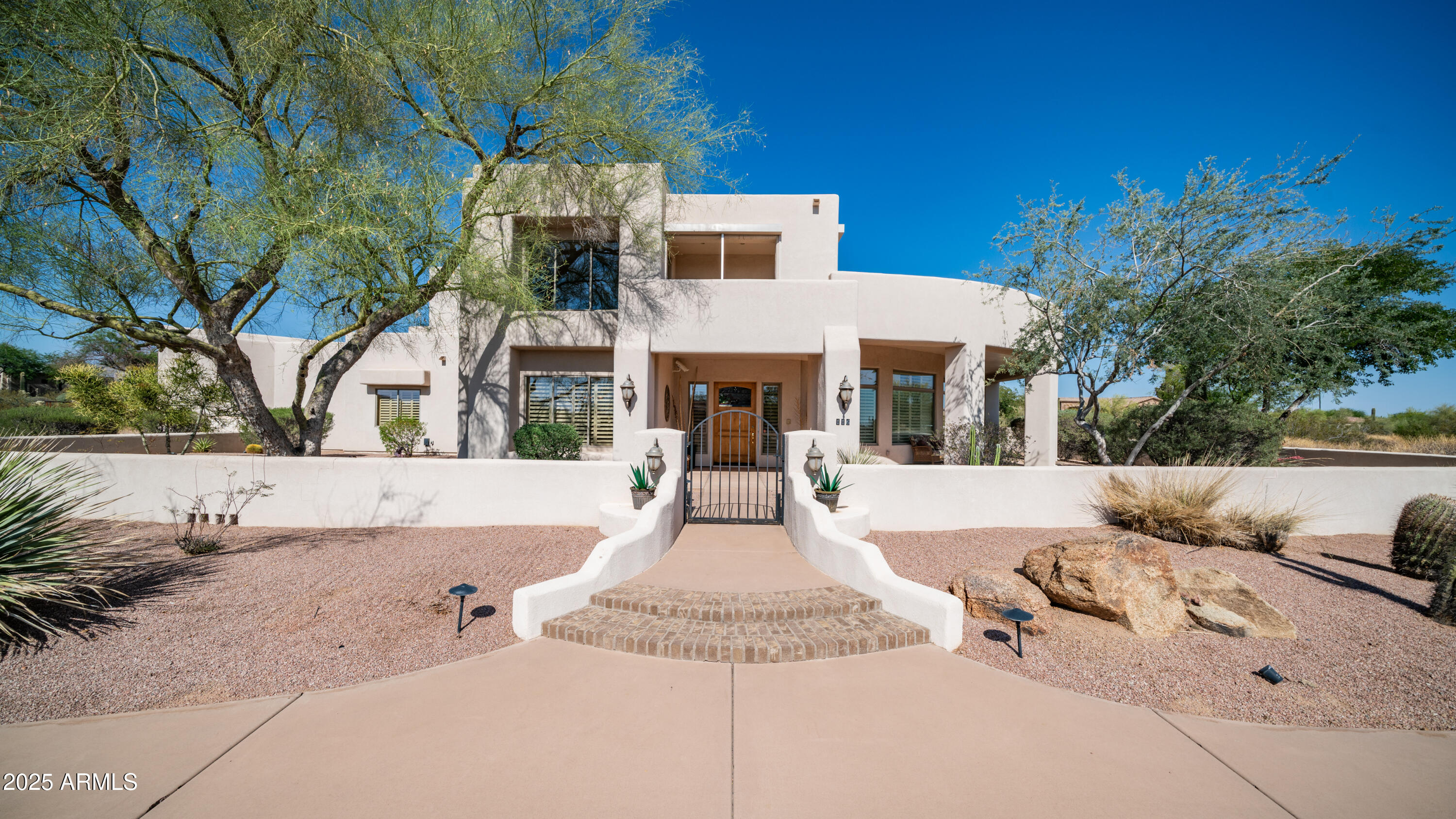 a front view of a house with entertaining space
