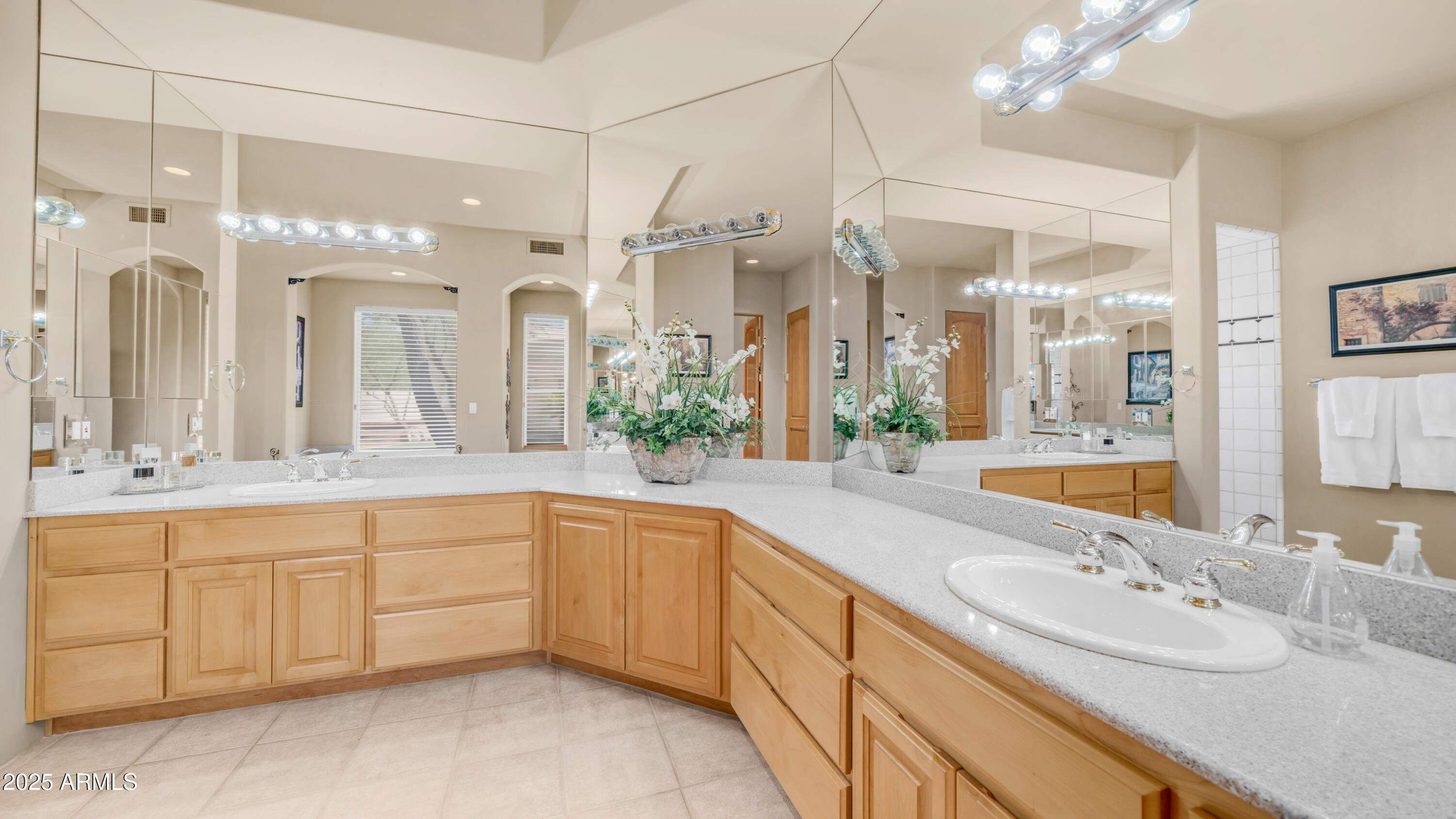 8540 East McDowell Road, Unit 116 Mesa, AZ 85207 - Photo 20 of 64 a bathroom with a granite countertop sink mirror and a
