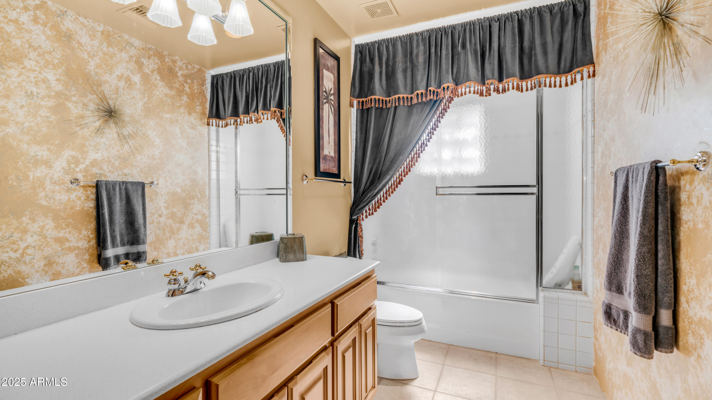 8540 East McDowell Road, Unit 116 Mesa, AZ 85207 - Photo 27 of 64 a bathroom with a sink toilet and shower