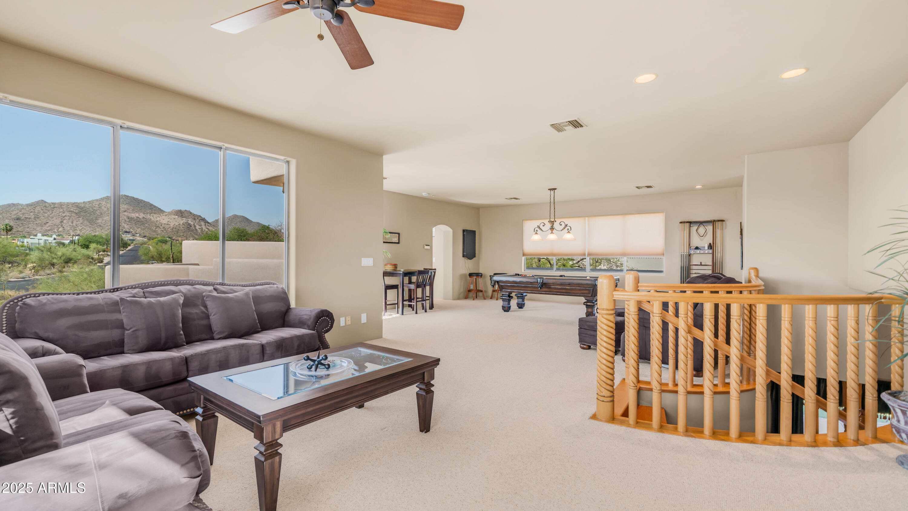 8540 East McDowell Road, Unit 116 Mesa, AZ 85207 - Photo 30 of 64 a living room with furniture and a large window