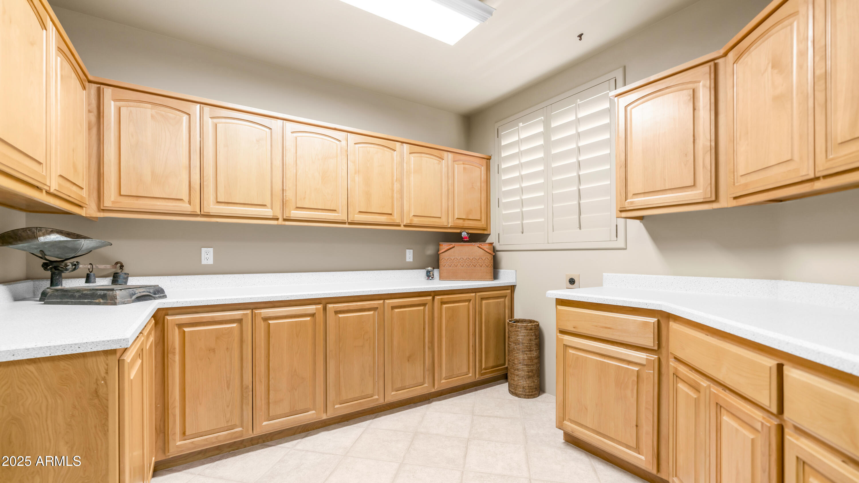 8540 East McDowell Road, Unit 116 Mesa, AZ 85207 - Photo 34 of 64 a kitchen with stainless steel appliances granite countertop a sink and cabinets with wooden floor